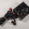 Picture of a thermaltake brand black desktop computer power supply on a white background.
