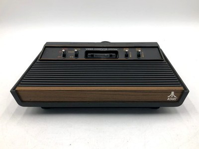 Atari 2600 Four-Switch Woodgrain Vintage Video Game Console Only Untested 1 Atari 2600 Four-Switch Woodgrain Vintage Video Game Console Only Untested